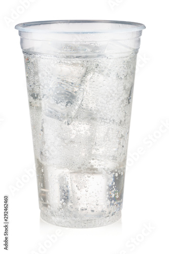 Soda carbonated drink with ice in a plastic cup isolated on white background