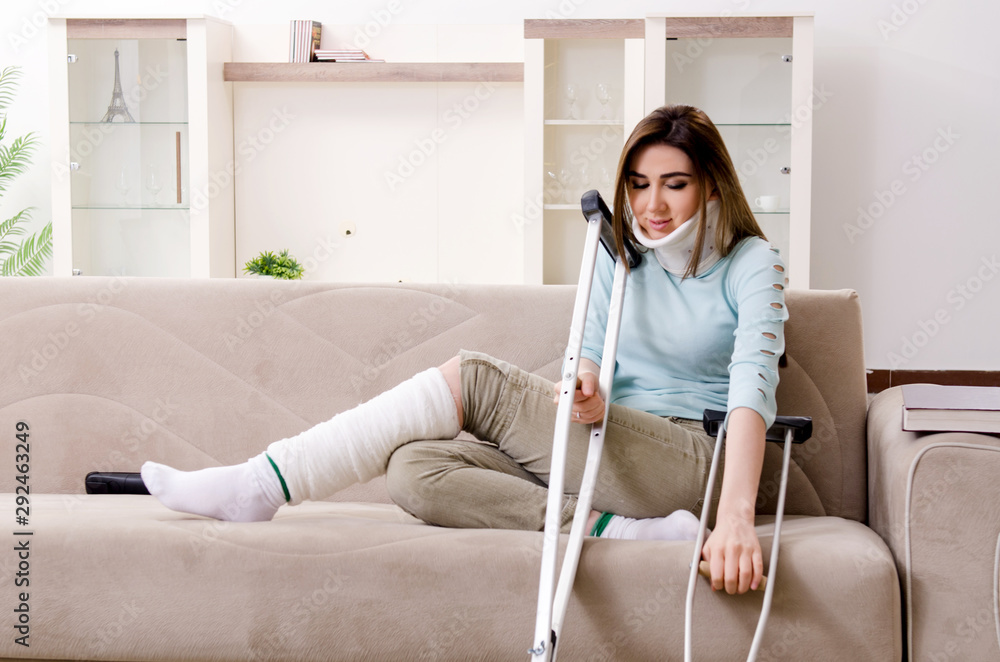 Young woman after car accident suffering at home Young woman after car accident suffering at home