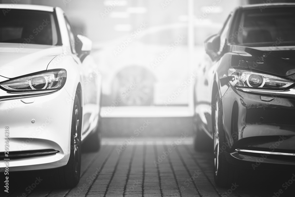selective between black and white cars - obrazy, fototapety, plakaty 