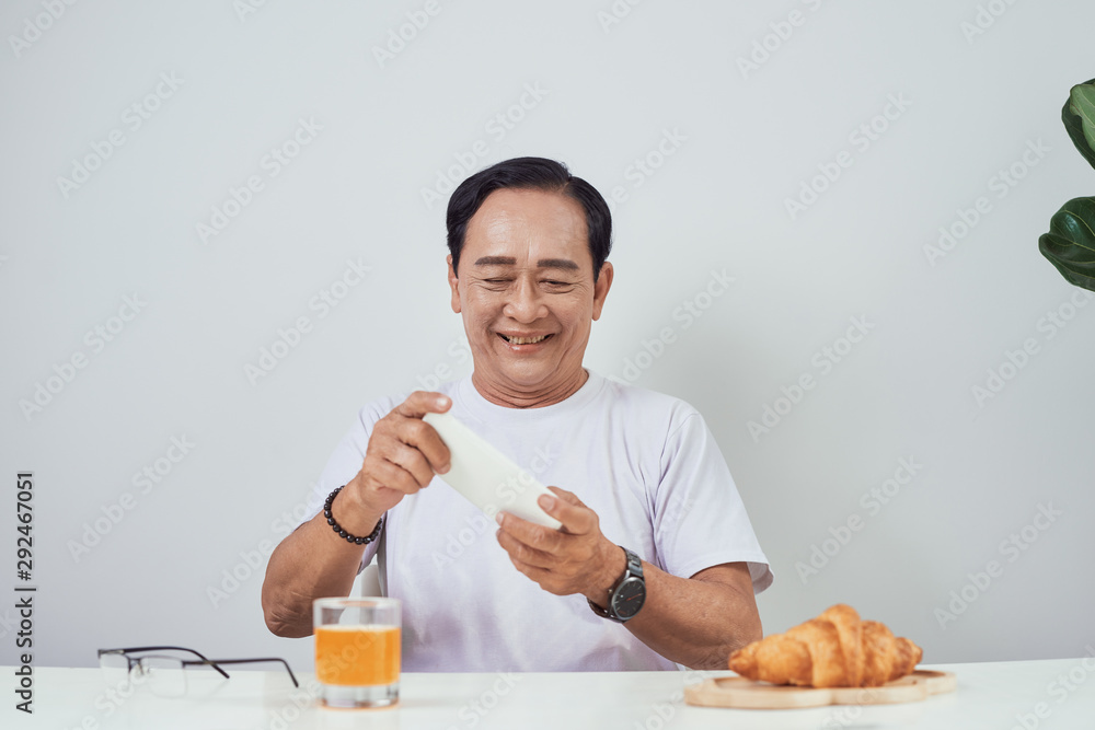Man having breakfast at home. Morning routine. resting at home. Man having breakfast at home. Morning routine. resting at home.
