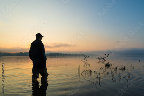 Fishing adventures, carp fishing at sunset. Active lifestyle concept