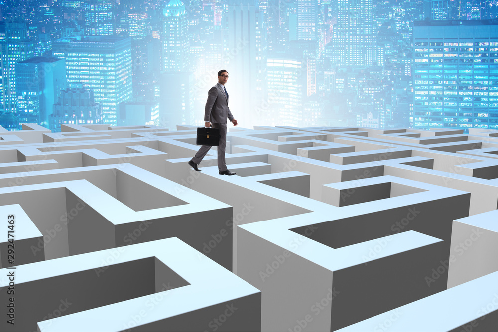 Businessman trying to escape from maze Businessman trying to escape from maze