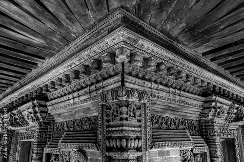 Detailed wood carvings of Hindu Gods and sculptures on ancient temples of Nepal.