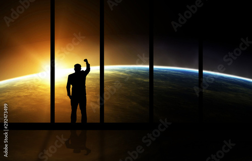 Global Business concept.businessman standing near windows looking at global communication for business,Elements of this image are furnished by NASA.