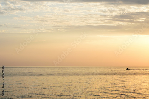 Sea and cloudy sky in the early morning near the coast of Sicily. Cefalu  Italy