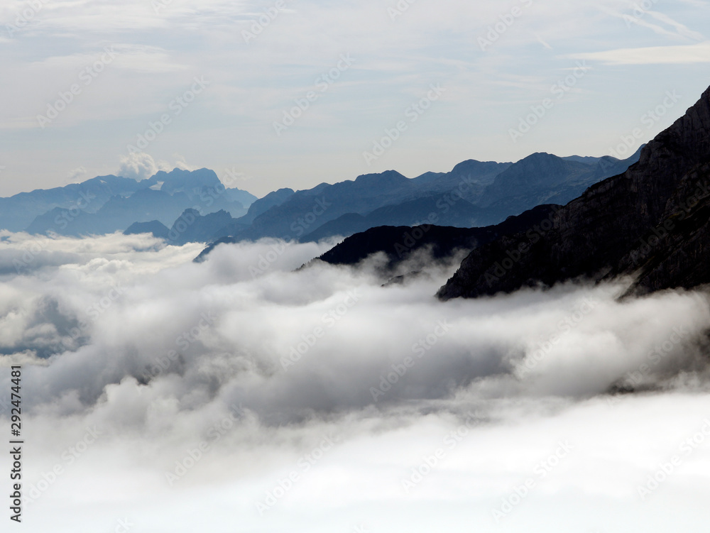 Climbing over the clouds in Berchtesgarden, Bavaria Alps