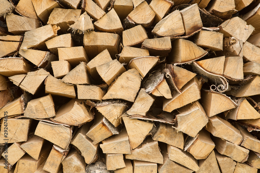 Woodpile - stack of wood. Firewood, sawn trees Woodpile - stack of wood. Firewood, sawn trees