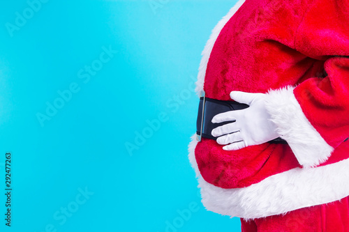 Santa Claus belly on blue background © tetxu