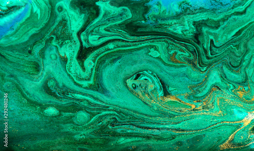 Green and gold ripples abstract background.