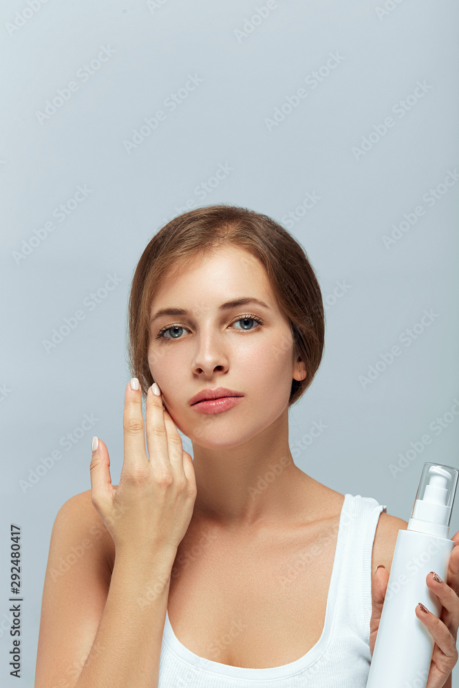 Beautiful Young Woman with Clean Fresh Skin. Face care. Facial treatment. Cosmetology, beauty and spa. Beautiful Young Woman with Clean Fresh Skin. Face care. Facial treatment. Cosmetology, beauty and spa.