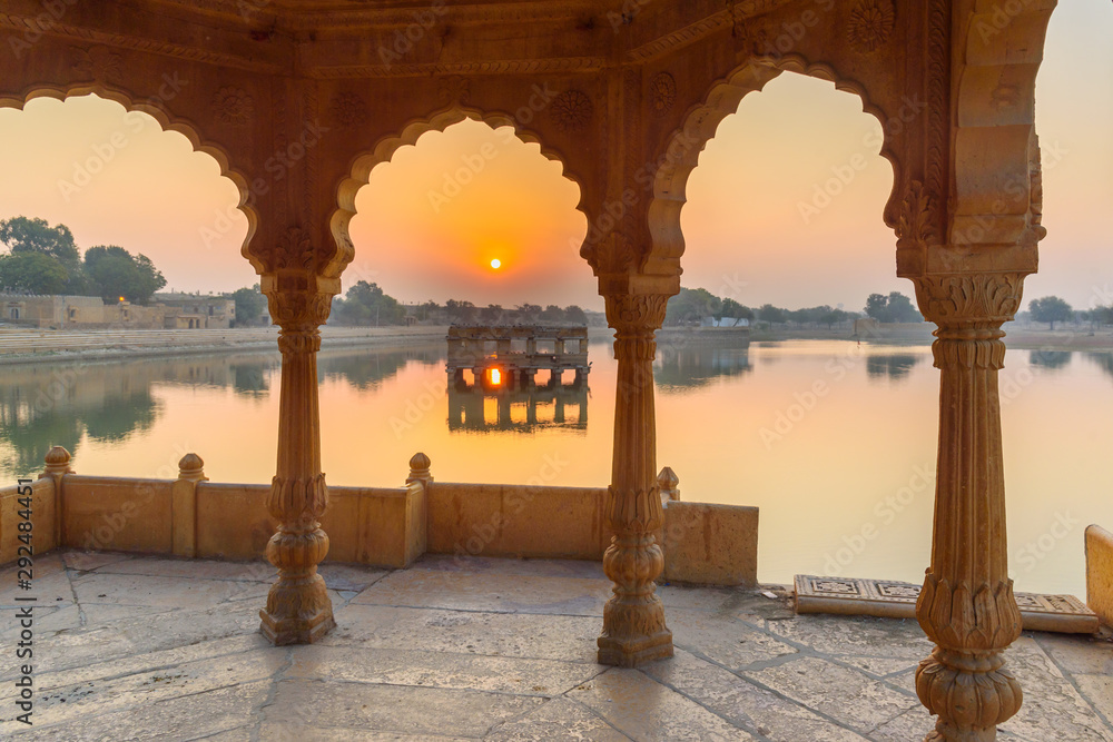 Gadisar lake in the morning at sunrise. Man-made water reservoir with temples in Jaisalmer. India