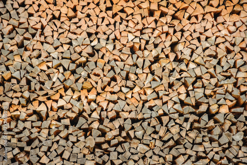 An array of firewood for burning in a stove is piled.