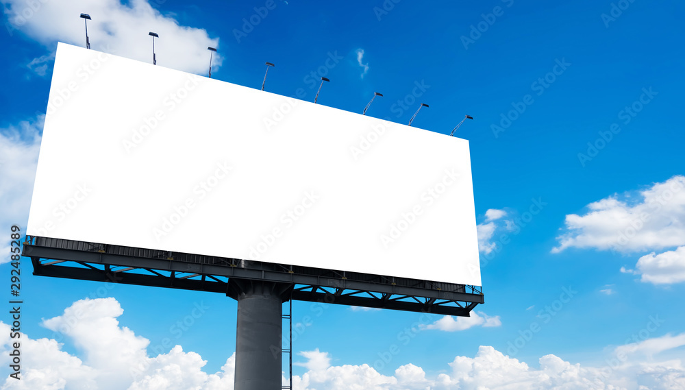 Mockup Large white blank billboard or white promotion poster displayed on the outdoor against the blue sky background. Promotion information for marketing announcements and details Mockup Large white blank billboard or white promotion poster displayed on the outdoor against the blue sky background. Promotion information for marketing announcements and details