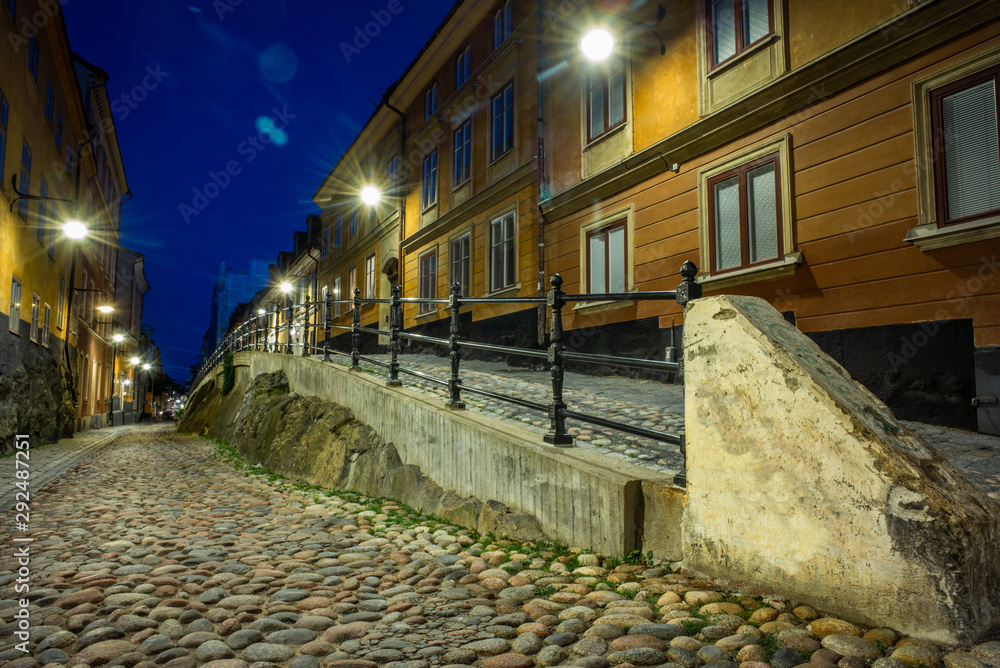 Old cobbled colorful  narrow street in Stockholm at night - 3