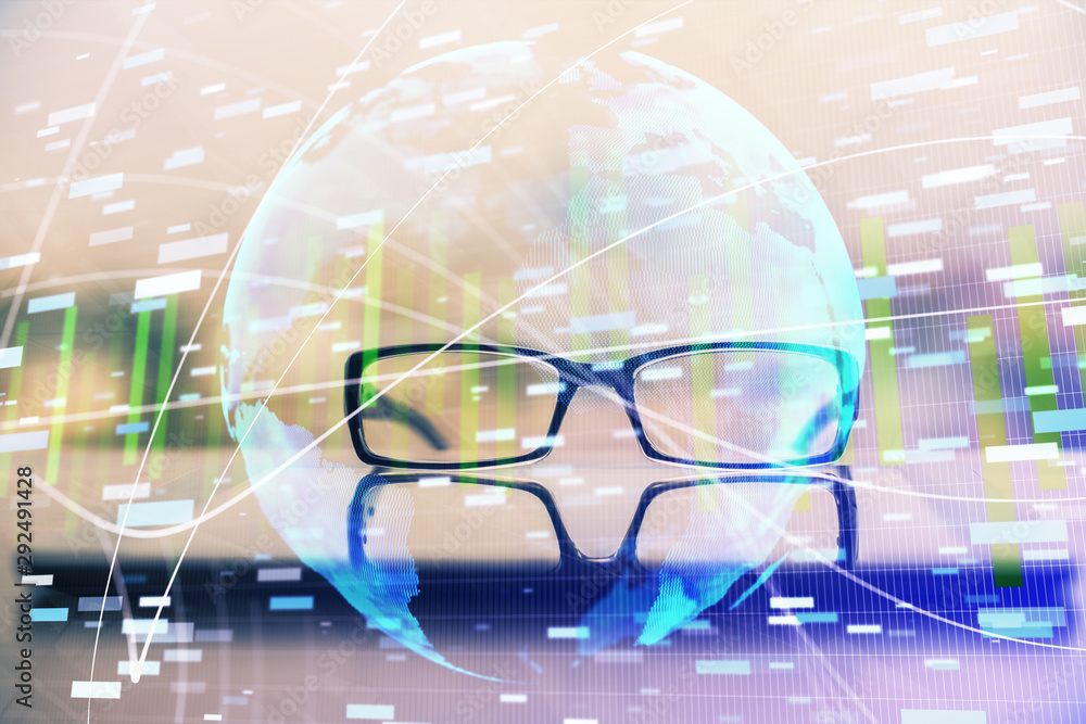 Fototapeta premium Business theme hologram with glasses on the table background. Concept of search. Double exposure.