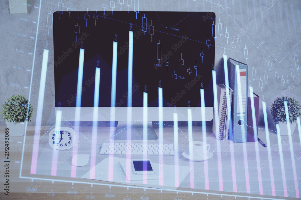 Forex graph hologram on table with computer background. Double exposure. Concept of financial markets. Forex graph hologram on table with computer background. Double exposure. Concept of financial markets.