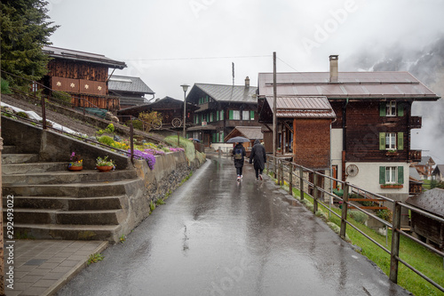 Beautiful scene of walkway and wooden houses in Murren a small town in rural area of Switzerland for background