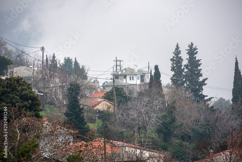 Foggy day above Milies village on Pelion mountain in Greece. photo