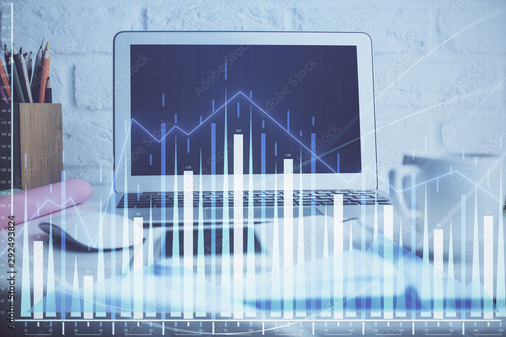 Stock market graph on background with desk and personal computer. Double exposure. Concept of financial analysis. Stock market graph on background with desk and personal computer. Double exposure. Concept of financial analysis.
