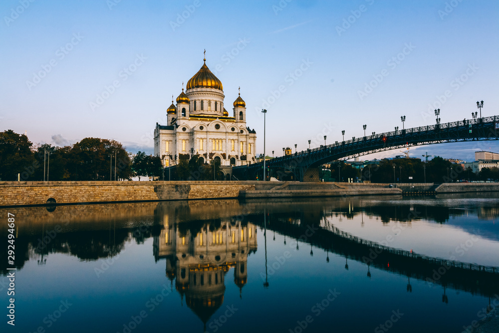 View from bridge to the Cathedral of Christ the Savior. moscow sightseeing in the morning. Beautiful white orthodox temple in Russian-Byzantine style with golden domes