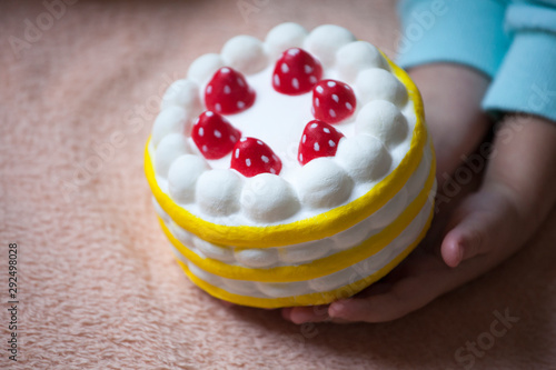 squishy dessert children hand plush background 