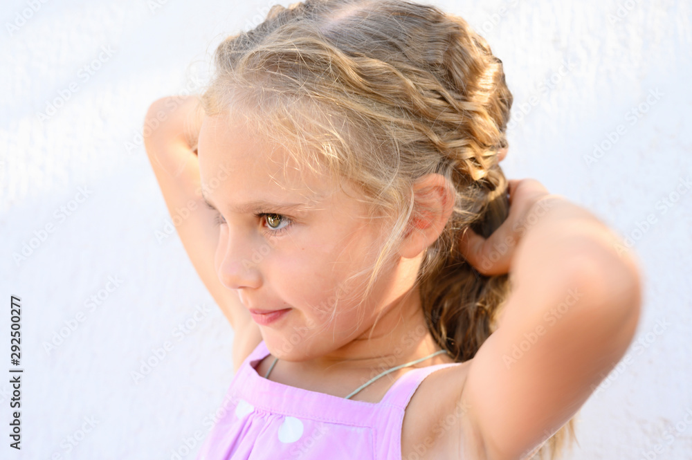 Portrait of a cute little child girl with curly hair Portrait of a cute little child girl with curly hair