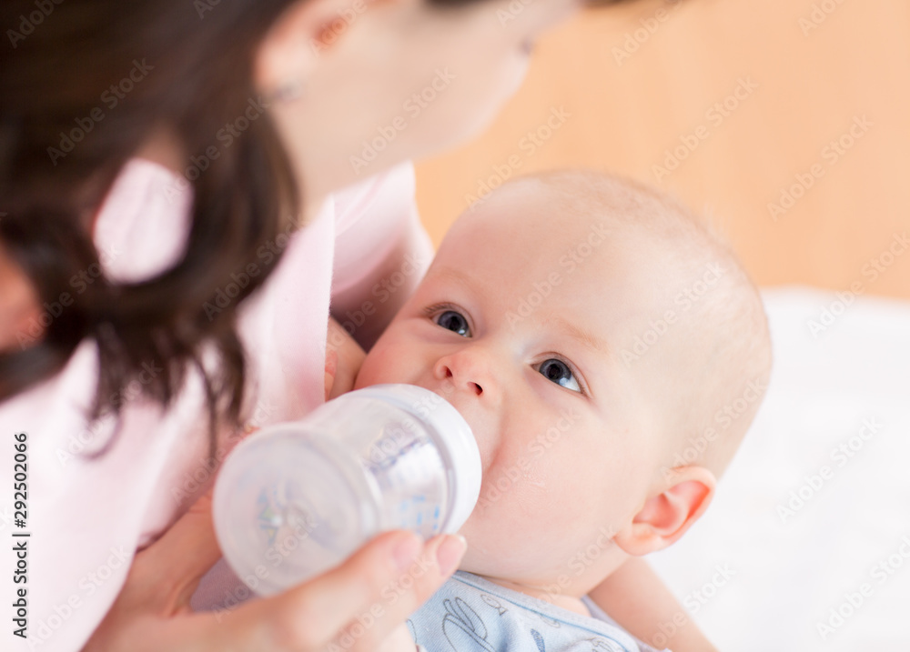 Little infant baby drinking from bottle Little infant baby drinking from bottle