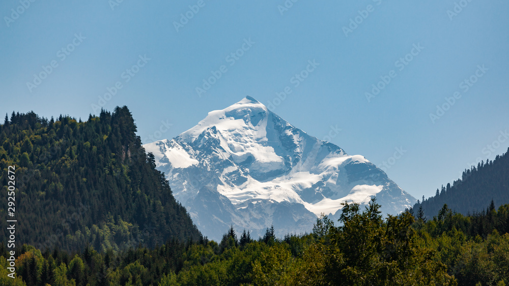 Mount Tetnuldi rises above the Great Caucasian Range in the upper Svaneti in Georgia, Mountain Landscape.