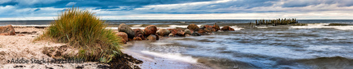 Panorama. Remains of old abandoned pier  Baltic Sea
