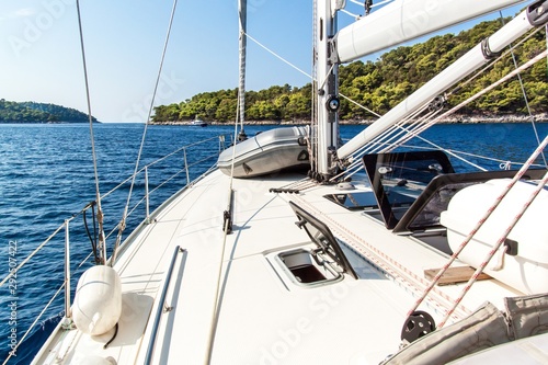 Sailing boat near Croatian island Lastovo. View from the deck of the yacht. Vacation on a boat. Sailing on the sea.