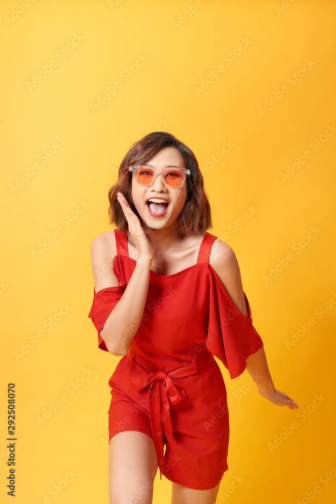 Studio portrait of surprised positive girl with short haircut dancing with smile. Studio portrait of surprised positive girl with short haircut dancing with smile.