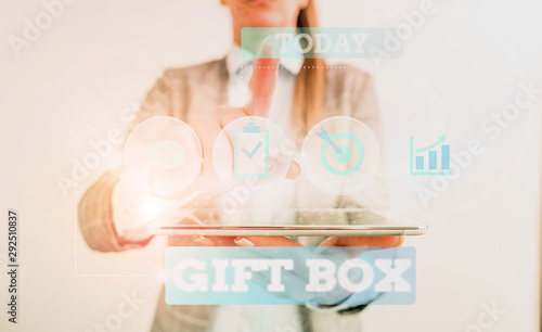 Text sign showing Gift Box. Business photo text A small cointainer with designs capable of handling presents Female human wear formal work suit presenting presentation use smart device photo