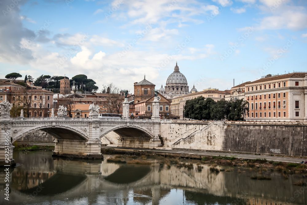 View of the Victor Emmanuel bridge and St. Peter's Cathedral in the early evening. Rome, Lazio, Italy