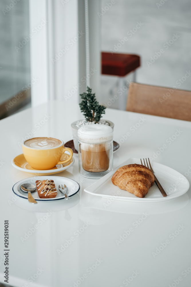 breakfast with coffee and croissant breakfast with coffee and croissant
