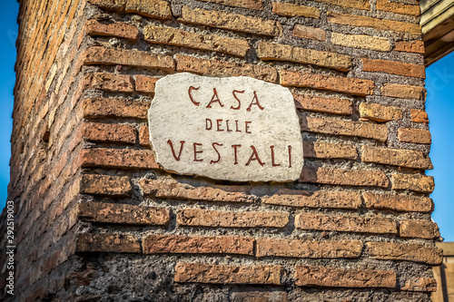 Great Rome. Ancient ruins of Forum Imperiale. A stone tablet that says house of the Vestal virgins.
 photo