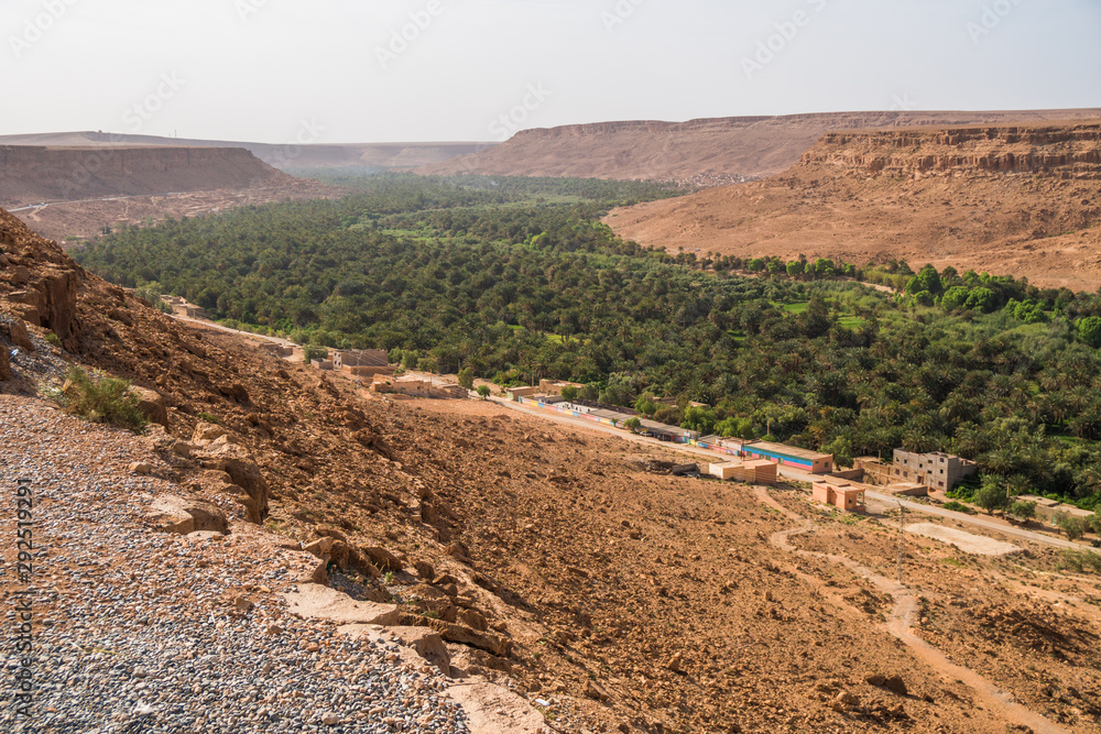 Panoramic view of a oasis and canyon mountains in beautiful Morocco