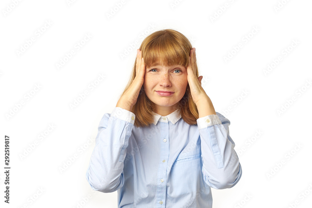 Cute redheaded young woman looking perplexed and disappointed. Image of young female model isolated on white background with copy space. Cute redheaded young woman looking perplexed and disappointed. Image of young female model isolated on white background with copy space.