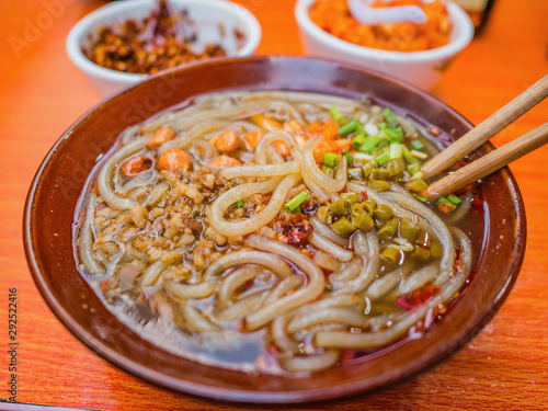 Close up Hot and sour glass noodle Famouse street food in china. photo