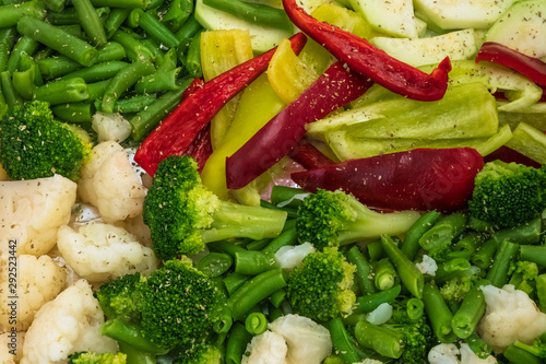 Mixed vegetables background: Broccoli, carrots, cauliflower, pepper and green beans. Organic salad