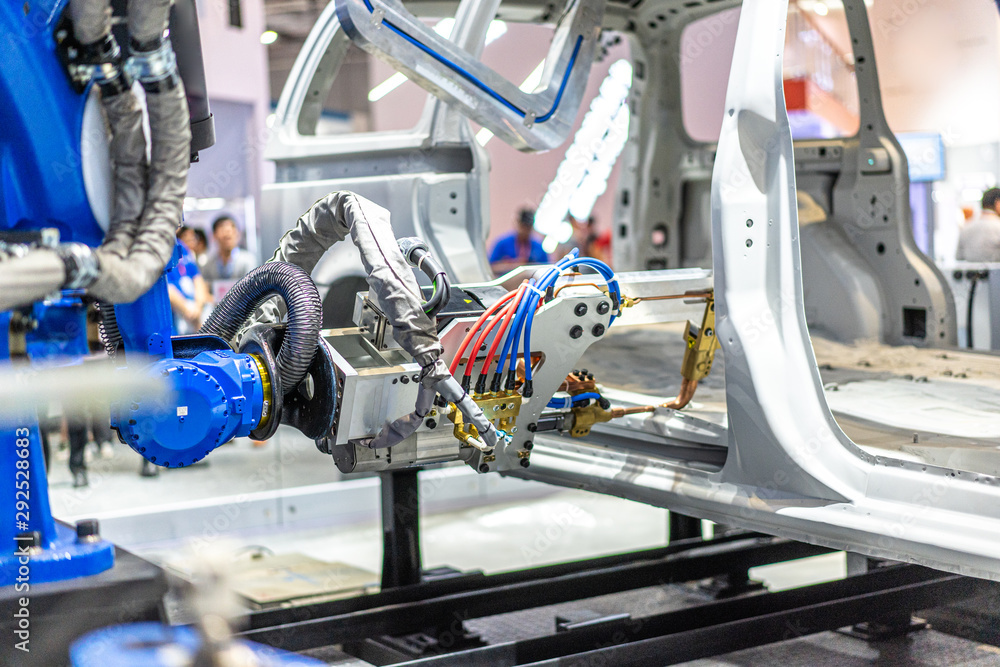 robot arm in factory robot arm in factory