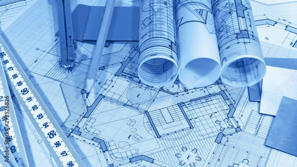 Blueprints: architectural drawings, yardstick - folding ruler & samples of modern interior decoration materials - decorative plastics smoothly rotate on the surface of the architectural plan Blueprints: architectural drawings, yardstick - folding ruler & samples of modern interior decoration materials - decorative plastics smoothly rotate on the surface of the architectural plan