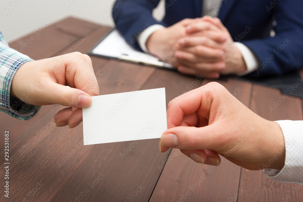 Obraz premium business executive exchanging business card blank. Copy space
