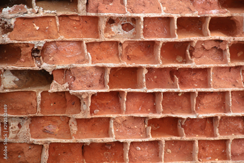 Obraz premium Texture of the old church brickwork destoyed by wind and rainfall.