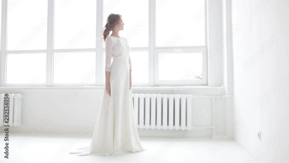 Elegant tender bride on a white background Elegant tender bride on a white background
