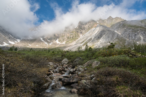 Mountain creek in the circus of Mount Triglav photo