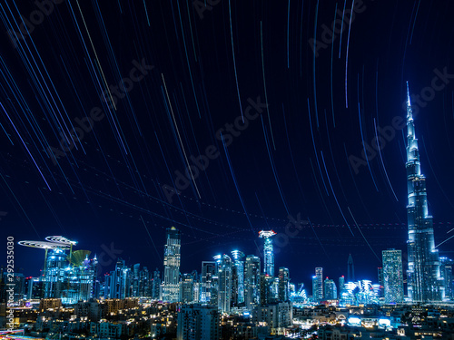 Photography Dubai cityscape with star trail at night