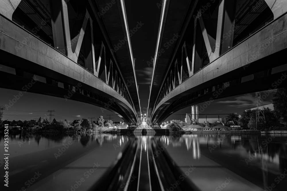 Under a big bridge at night, Bottom of a big bridge, minna todenhagen bridge, fine art, black and white photo