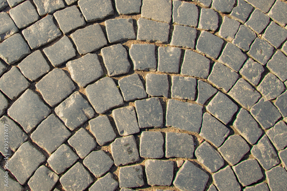 Radial lined cobblestone bridge of gray color. Radial lined cobblestone bridge of gray color.