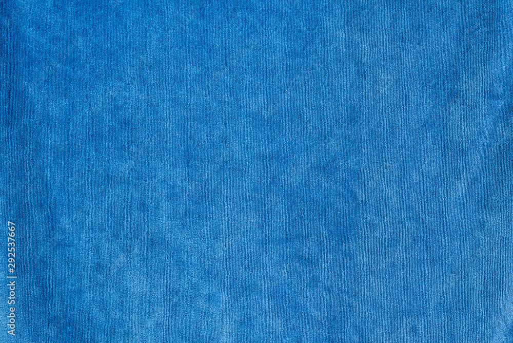 Smooth denim seamless fabric texture. Dark blue color Smooth denim seamless fabric texture. Dark blue color