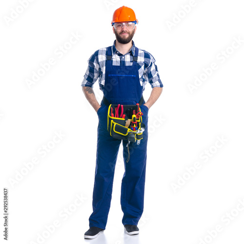Man worker builder with helmet and protective glasses, tool belt on white background isolation